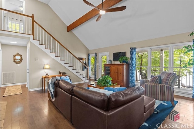 2061 Sugar Creek Trl, Buckhead, GA 30625 - living room with high vaulted ceiling, ceiling fan, stairway, wood finished floors, and beamed ceiling