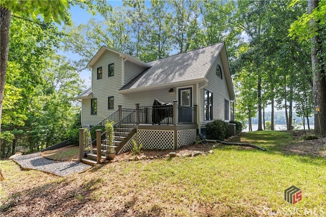 2061 Sugar Creek Trl, Buckhead, GA 30625 - rear view of property featuring a wooden deck, a yard, roof with shingles, and stairs