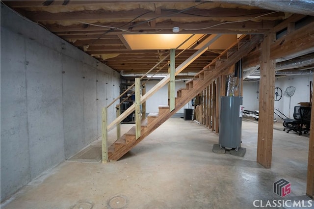 2061 Sugar Creek Trl, Buckhead, GA 30625 - unfinished basement featuring electric water heater and stairs