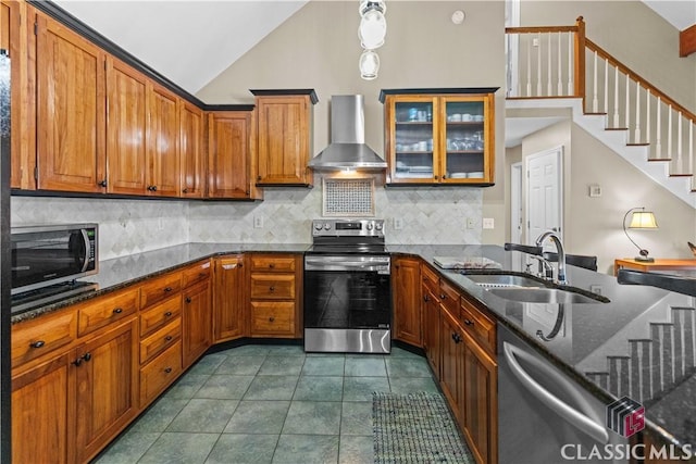 2061 Sugar Creek Trl, Buckhead, GA 30625 - kitchen with wall chimney exhaust hood, stainless steel appliances, lofted ceiling, brown cabinets, and decorative backsplash