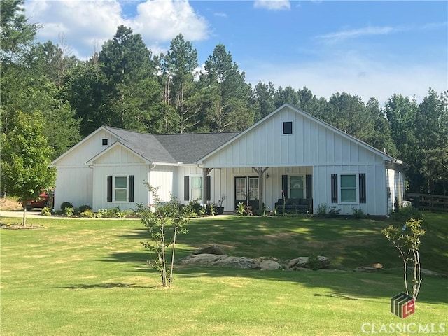 TRCT2 Paoli St, Comer, GA 30629 - view of front facade with a front yard, board and batten siding, and a porch