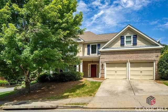 232 Township Ln, Athens, GA 30606 - view of front of house featuring brick siding, driveway, and a garage