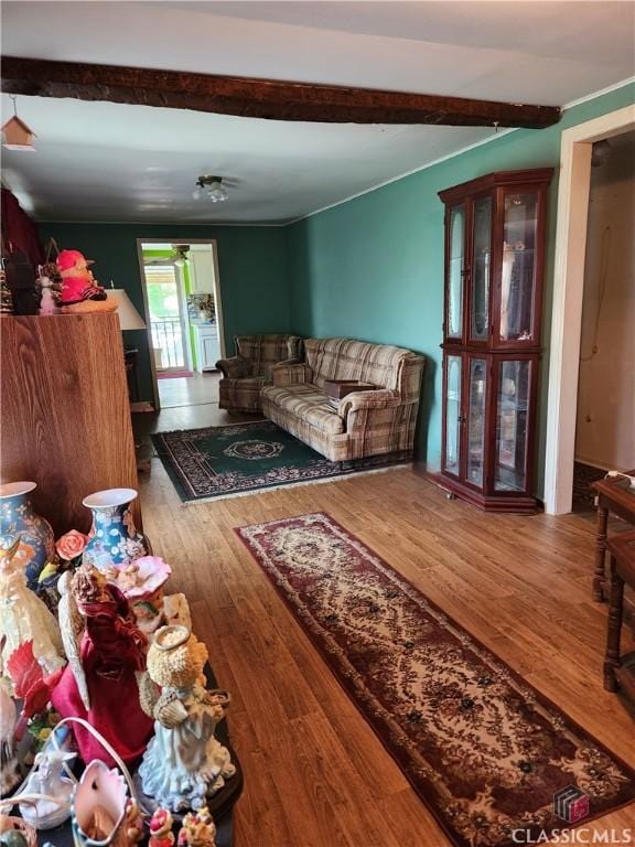4660 Fairplay Rd, Madison, GA 30650 - living room with wood finished floors and beamed ceiling