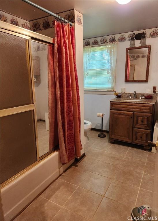4660 Fairplay Rd, Madison, GA 30650 - bathroom featuring tile patterned flooring, shower / bathtub combination with curtain, and vanity