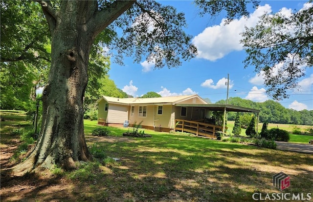 4660 Fairplay Rd, Madison, GA 30650 - rear view of property featuring a yard and a deck