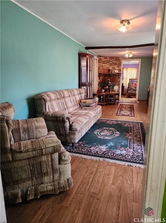 4660 Fairplay Rd, Madison, GA 30650 - living area featuring wood finished floors and crown molding