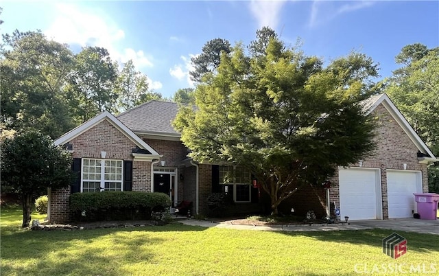 38 Kathleen Ct, Colbert, GA 30628 - view of front facade featuring brick siding, a front yard, a garage, and driveway