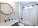 1069 Dean Hill Rd, Monroe, GA 30655 - bathroom with vanity and shower / tub combo with curtain