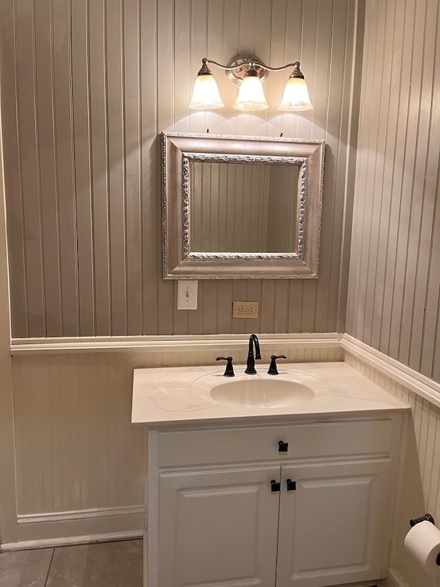 bathroom with vanity and tile patterned floors