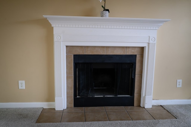 details with a fireplace and baseboards