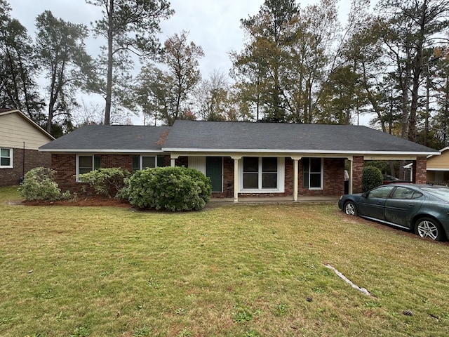 single story home with a front yard