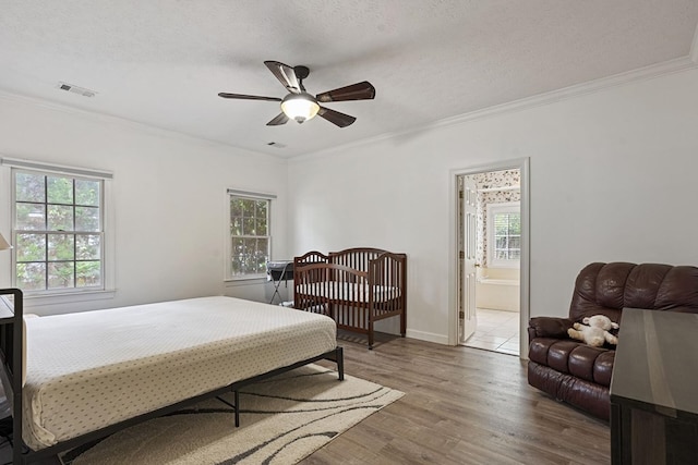 6426 Springwater Dr, Columbus, GA 31904 - bedroom with visible vents, ornamental molding, and multiple windows