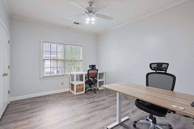 6426 Springwater Dr, Columbus, GA 31904 - office featuring wood finished floors, crown molding, a ceiling fan, and a textured ceiling