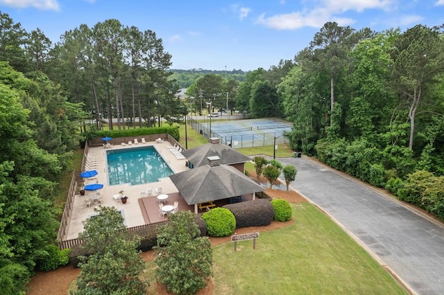 6426 Springwater Dr, Columbus, GA 31904 - aerial view of property and surrounding area featuring a pool area and a heavily wooded area
