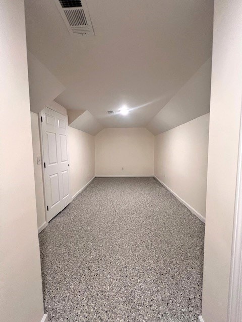 2904 Auburn Ave, Columbus, GA 31906 - bonus room with baseboards, lofted ceiling, and speckle patterned floor