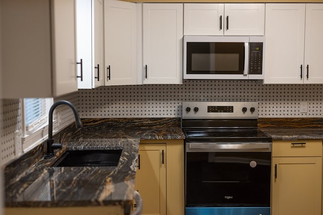 kitchen featuring white cabinetry, sink, and stainless steel appliances