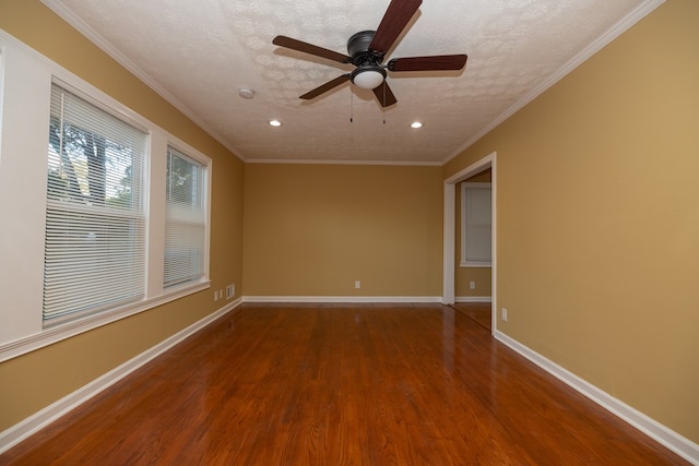 unfurnished room with ceiling fan, crown molding, wood-type flooring, and a textured ceiling