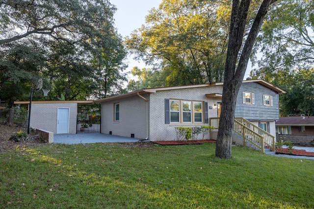 back of property with a yard and a patio