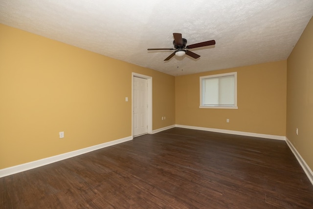 unfurnished room featuring a textured ceiling, ceiling fan, and dark hardwood / wood-style floors