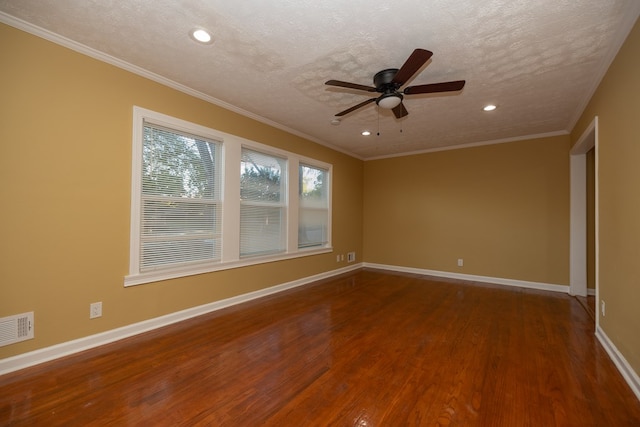 spare room with hardwood / wood-style floors, a textured ceiling, ceiling fan, and crown molding