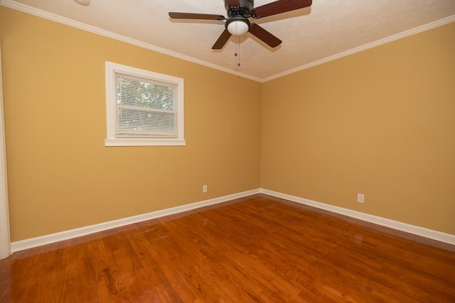 spare room with crown molding, hardwood / wood-style floors, and ceiling fan