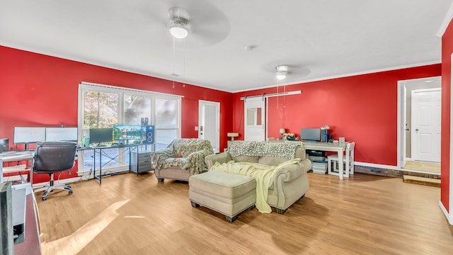 living room featuring hardwood / wood-style flooring and ceiling fan