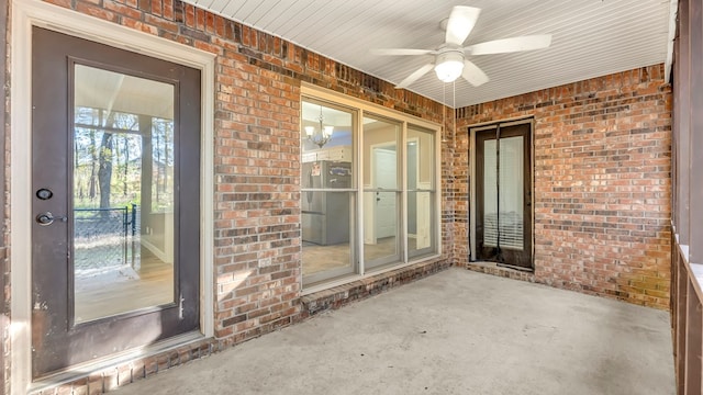 doorway to property featuring ceiling fan