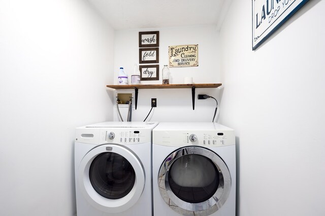 washroom featuring separate washer and dryer