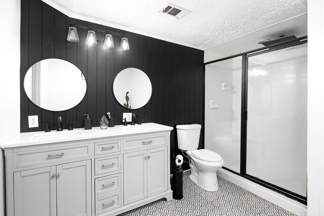 bathroom featuring wood walls and a shower with shower door