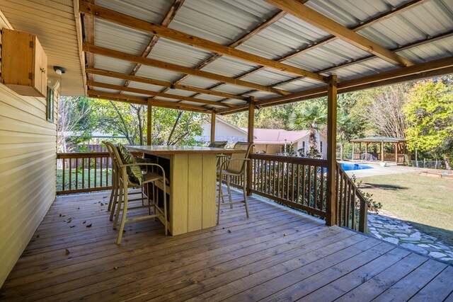 wooden deck with exterior bar