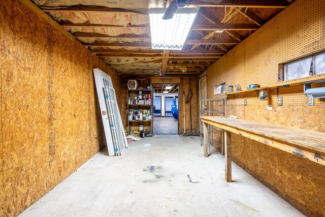 basement with a workshop area