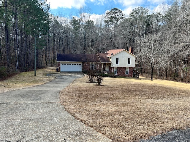 split level home featuring a garage