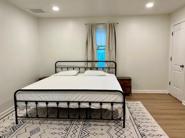 6231 Lynridge Ave, Columbus, GA 31909 - bedroom featuring wood finished floors, recessed lighting, and baseboards