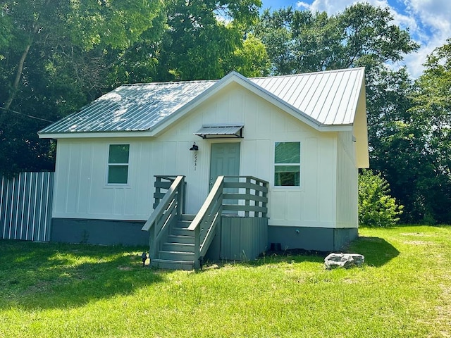 6231 Lynridge Ave, Columbus, GA 31909 - view of front facade featuring metal roof and board and batten siding