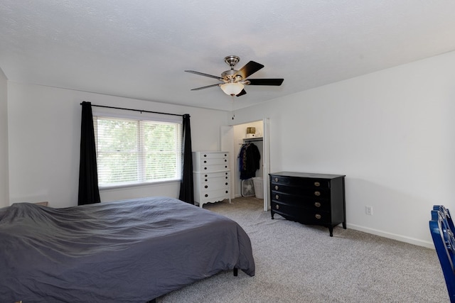 1305 Forest Ave Unit 00011, Columbus, GA 31906 - carpeted bedroom featuring ceiling fan, baseboards, and a spacious closet