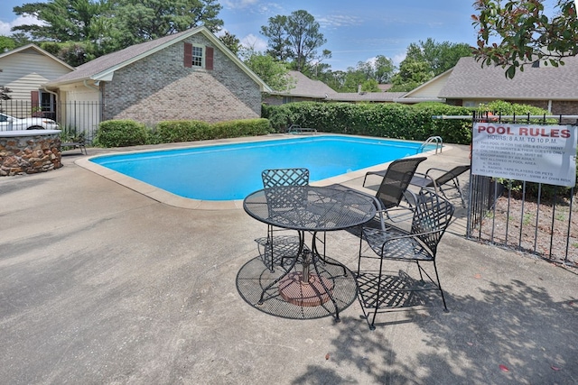 1305 Forest Ave Unit 00011, Columbus, GA 31906 - community pool with a patio area