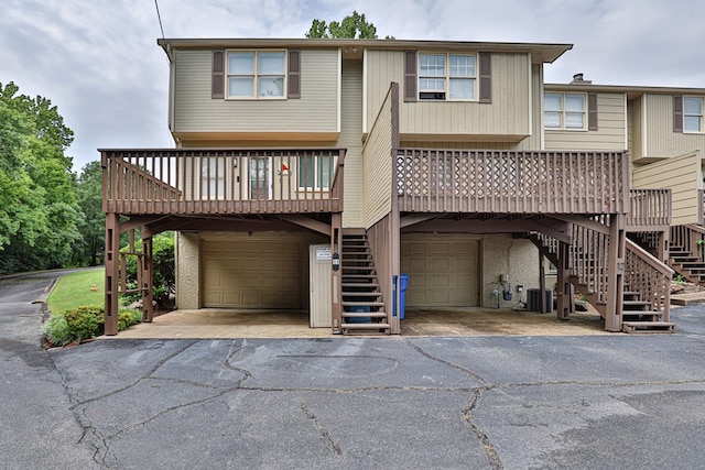1305 Forest Ave Unit 00011, Columbus, GA 31906 - townhome / multi-family property featuring stairway, a garage, and driveway