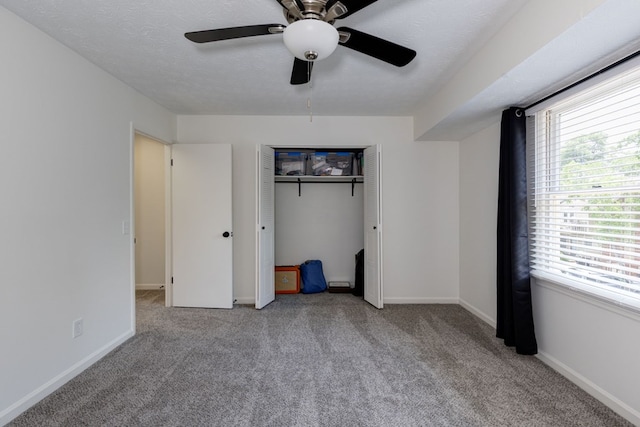1305 Forest Ave Unit 00011, Columbus, GA 31906 - unfurnished bedroom with carpet, a closet, ceiling fan, and baseboards
