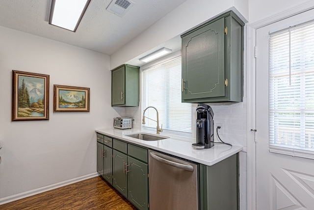 1305 Forest Ave Unit 00011, Columbus, GA 31906 - kitchen with dishwasher, a sink, green cabinetry, and dark wood finished floors