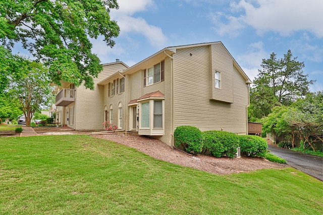 1305 Forest Ave Unit 00011, Columbus, GA 31906 - rear view of property featuring a yard