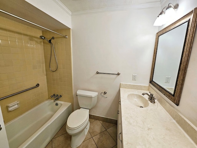 full bathroom featuring vanity, crown molding, tiled shower / bath, tile patterned flooring, and toilet