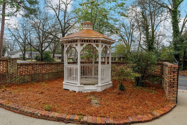 view of yard with a gazebo and fence