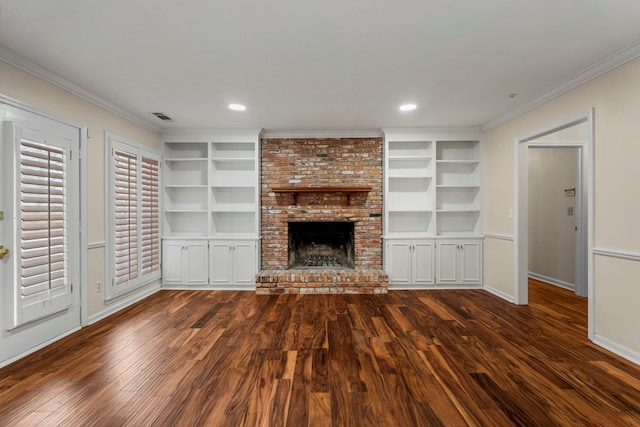 unfurnished living room featuring dark wood-style floors, visible vents, crown molding, and built in features