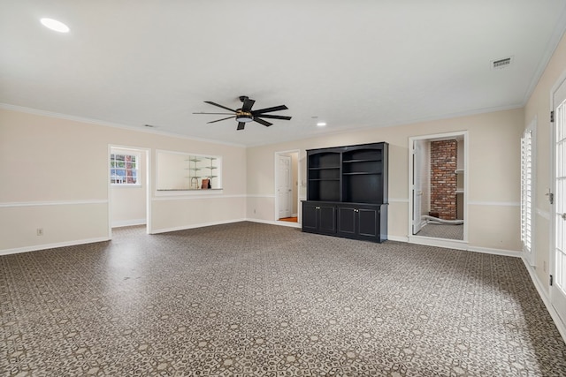 unfurnished living room with ceiling fan, baseboards, visible vents, and ornamental molding