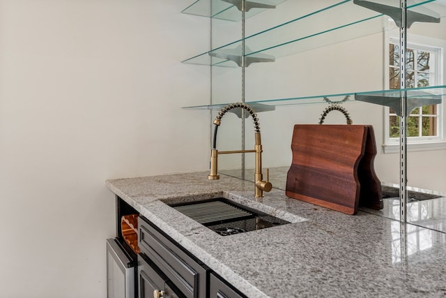 bar featuring a sink