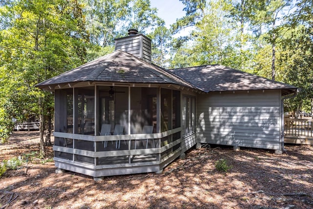 2231 Holly Ln, Pine Mountain, GA 31822 - back of property with a shingled roof, a sunroom, and a chimney