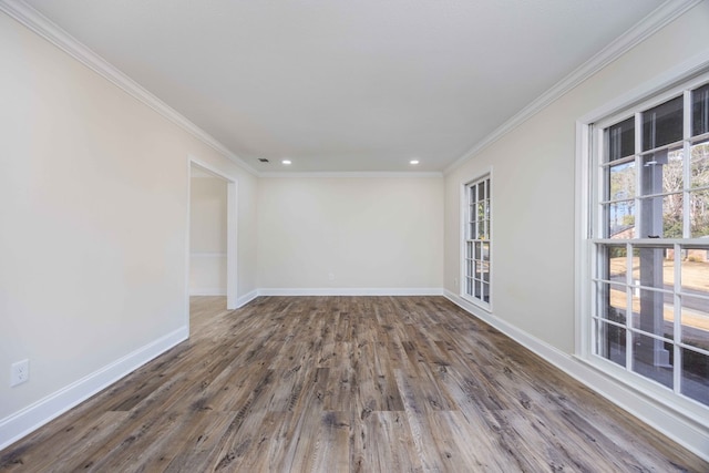 unfurnished room featuring crown molding and dark hardwood / wood-style floors