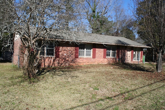 exterior space with a yard