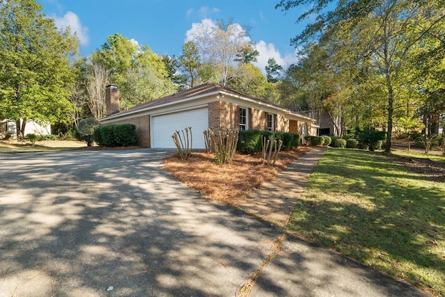 view of side of property with a garage