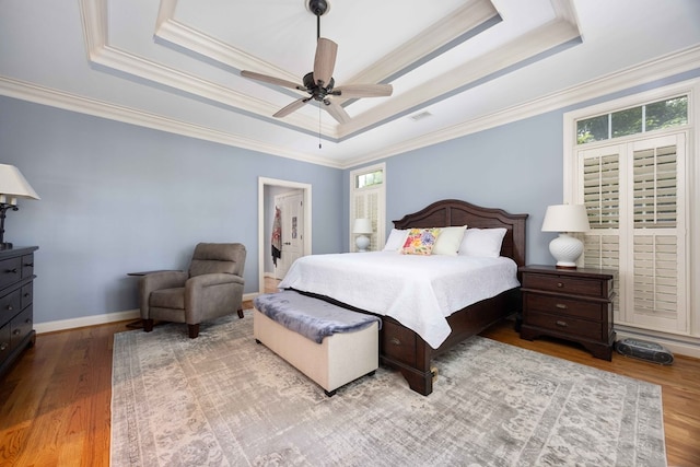 4730 Turnberry Ln Unit 15, Columbus, GA 31909 - bedroom featuring a tray ceiling, wood finished floors, ornamental molding, and a ceiling fan